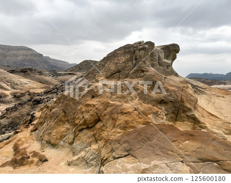 Colorful mountains in Timna Park in the Arava desert 125600180