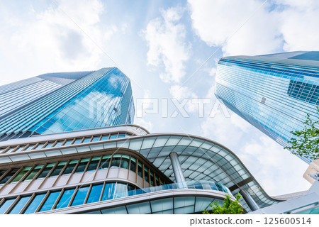 High-rise building in front of Takanawa Gateway Station 125600514