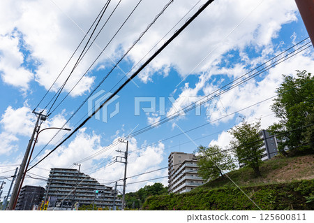 Oyamadairi Park and apartment building, spring blue sky, Oyamagaoka, Machida, Tokyo 125600811