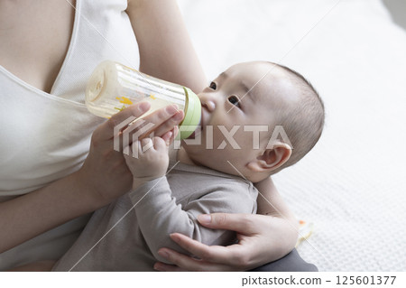 4 month old baby and mom 4 month old baby and mom 125601377
