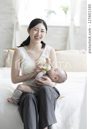 4 month old baby and mom 4 month old baby and mom 125601380