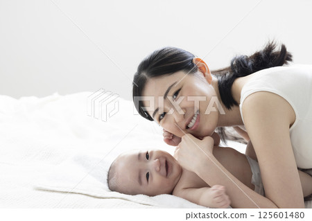 4 month old baby and mom 4 month old baby and mom 125601480