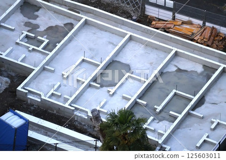 Foundation of an apartment building under construction 125603011