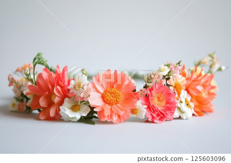 Bright floral crown made of pink and white flowers perfect for summer festivals or parties 125603096