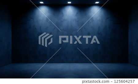 A dimly lit, empty room with dark blue textured walls and a smooth dark blue floor A dimly lit, empty room with dark blue textured walls and a smooth dark blue floor 125604257