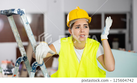 Upset female foreman unhappy with work done Upset female foreman unhappy with work done 125604742