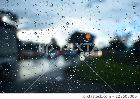 raindrop on windshield, car drive in rainy day weather 125605000