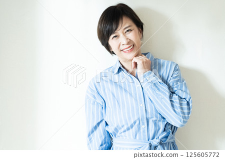 Youthful senior woman portrait Youthful senior woman portrait 125605772