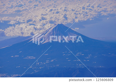 The majestic Mount Fuji as seen from inside the aircraft The majestic Mount Fuji as seen from inside the aircraft 125606809