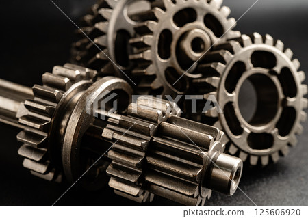 Gear and cogs wheels, clock mechanism, brass metal engine industrial. Gear and cogs wheels, clock mechanism, brass metal engine industrial. 125606920