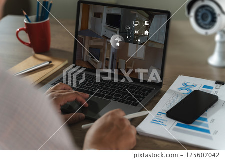 cctv security system man monitoring at office from smart phone Camera Footage On Screen 125607042
