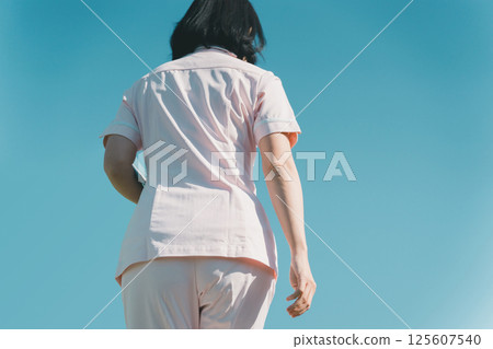 Nurse in her 50s Nurse in her 50s 125607540