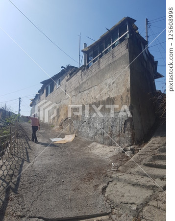 demolished house before reconstruction demolished house before reconstruction 125608998