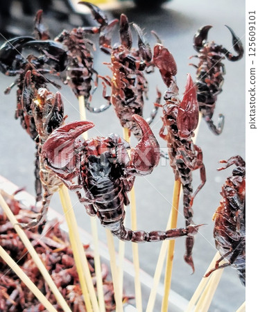 Fried Scorpion Skewers An Exotic Street Food Delight. 125609101