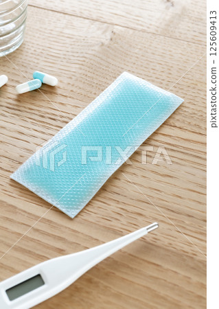 Cooling gel sheet for when you have a fever Cooling gel sheet for when you have a fever 125609413