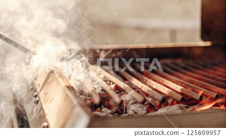 air pollution PM2.5 concept, Grill with smoky atmosphere and glowing embers 125609957