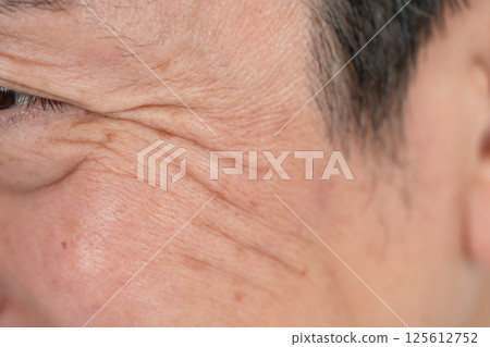 Male eye corner wrinkles Male eye corner wrinkles 125612752
