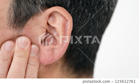 Male ear up 125612761