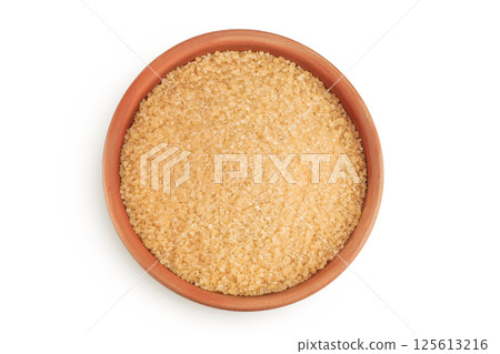 The brown sugar in ceramic bowl isolated on white background. Top view. Flat lay The brown sugar in ceramic bowl isolated on white background. Top view. Flat lay 125613216
