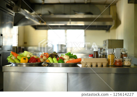 Fresh vegetables and ingredients on a counter ready for cooking class at a culinary school 125614227