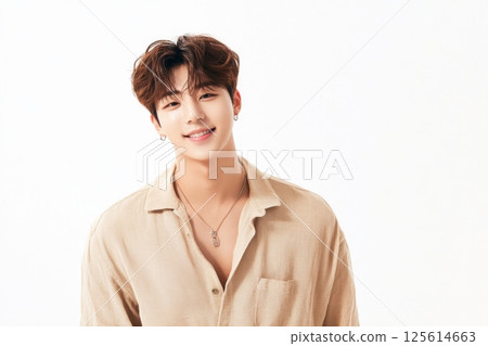 Smiling young Asian man in casual fashion portrait 125614663