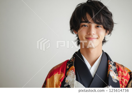 Smiling young Asian man in casual fashion portrait 125614736