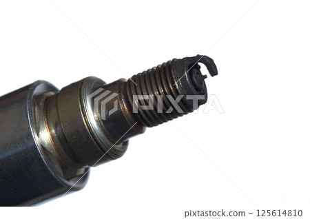 Plugs that are covered with black carbon Plugs that are covered with black carbon 125614810
