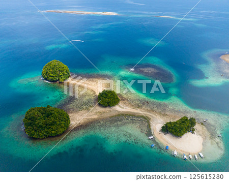 Cluster of islands and blue sea in Surigao del Sur, Philippines. Britania Islands. 125615280