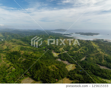 Aerial view of mountain valleys and green forest. Santa Fe, Tablas, Romblon. Philippines. Aerial view of mountain valleys and green forest. Santa Fe, Tablas, Romblon. Philippines. 125615333