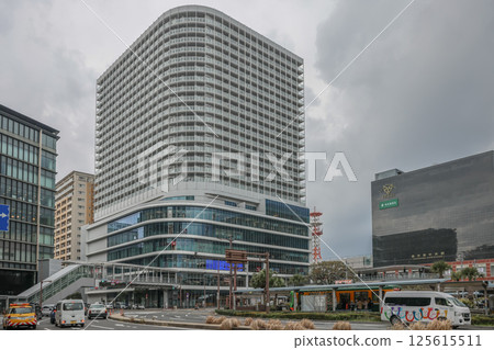 March 24 2025 Modern Urban Building with Busy Street in Commercial Districtv, Japan 125615511