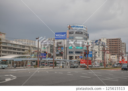 March 24 2025 City Intersection with Tall Buildings and Ferris Wheel in Urban Downtown, Japan 125615513