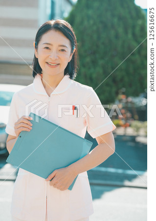 Nurse in her 50s 125616675