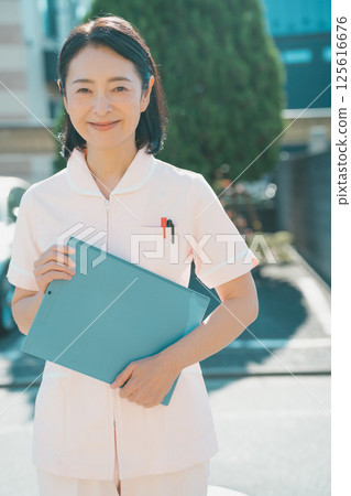 Nurse in her 50s 125616676