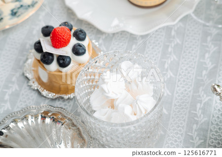 waffle cake with airy filling and berries. Aesthetic cake on the table 125616771