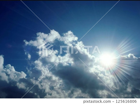 Blue sky and white clouds with bright sun 125616806