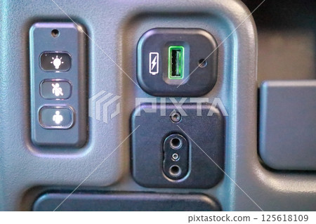 Airplane seat icons, power and earphone jack 125618109