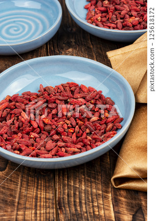 Pile of Dried goji berries. 125618172