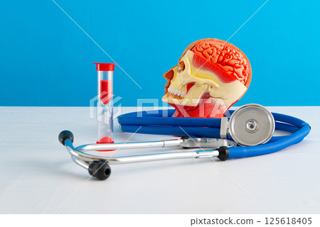 Healthcare and medical concept human brain and hourglass Healthcare and medical concept human brain and hourglass 125618405