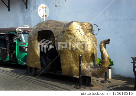 Unique Elephant-Shaped Tuk-Tuk with Decorative Design in Sri Lanka 125618510