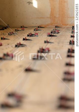 Tile Leveling System Components on The Floor. Tile Leveling System Components on The Floor. 125621855