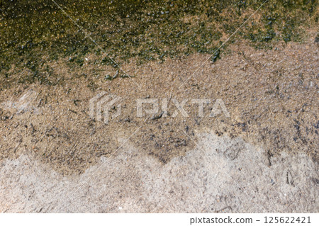Wet cement surface art retro closeup 125622421