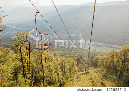 Landscape with funicular on forest mountain Landscape with funicular on forest mountain 125622743