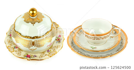 Vintage porcelain candy bowl ,cup and saucer isolated on white. Collage. Wide photo. 125624500