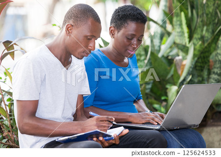 portrait of young students with laptop. 125624533