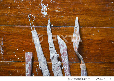 Close up Tools for forming clay on background 125624907