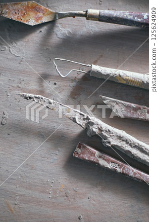 Close up Tools for forming clay on background 125624909