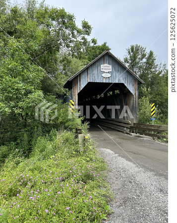 Eustis Covered Bridge vertical in Quebec, Canada in morning Eustis Covered Bridge vertical in Quebec, Canada in morning 125625072