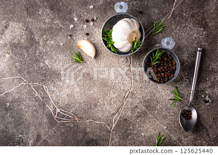 Rosemary, garlic, salt and pepper. Rosemary, garlic, salt and pepper. 125625440