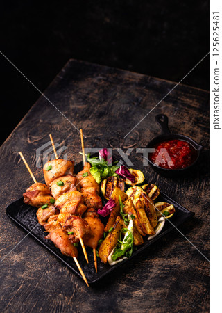 Chicken skewers kebab with vegetables Chicken skewers kebab with vegetables 125625481