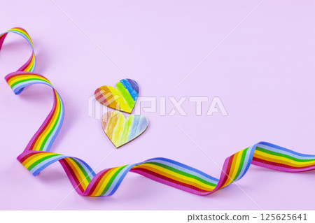 A colorful rainbow fabric strip symbolizing LGBTQ pride diversity and inclusivity. Represents support and celebration of gender and identity expression. 125625641